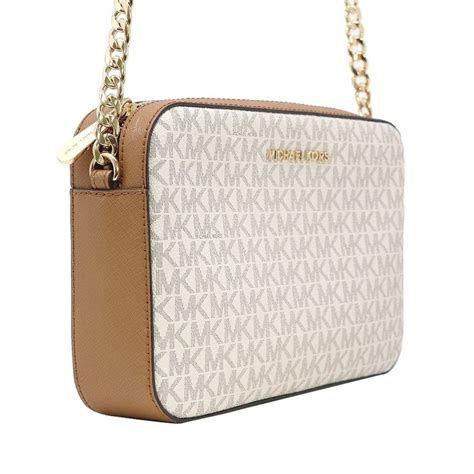 michael kors sling bag white.